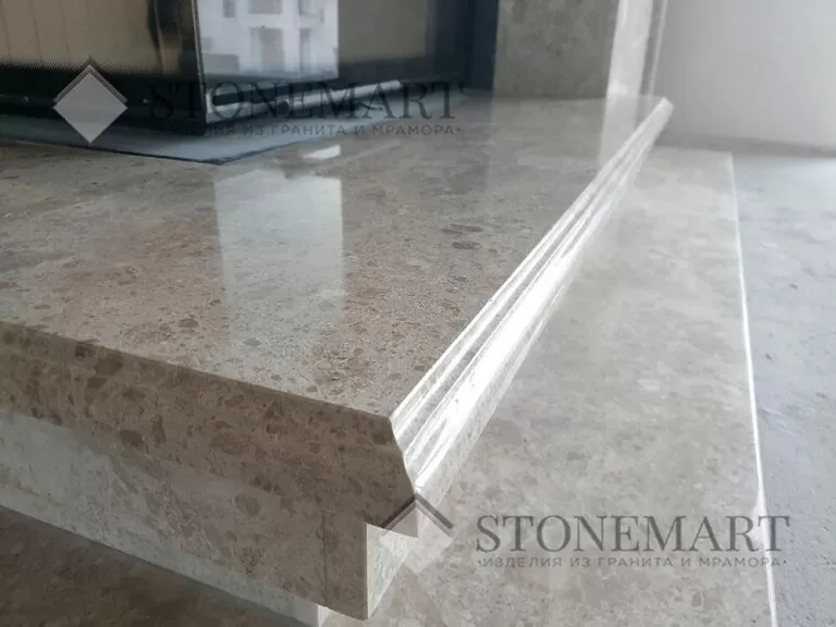 Облицовка камина мрамором в исполнении компании Stonemart