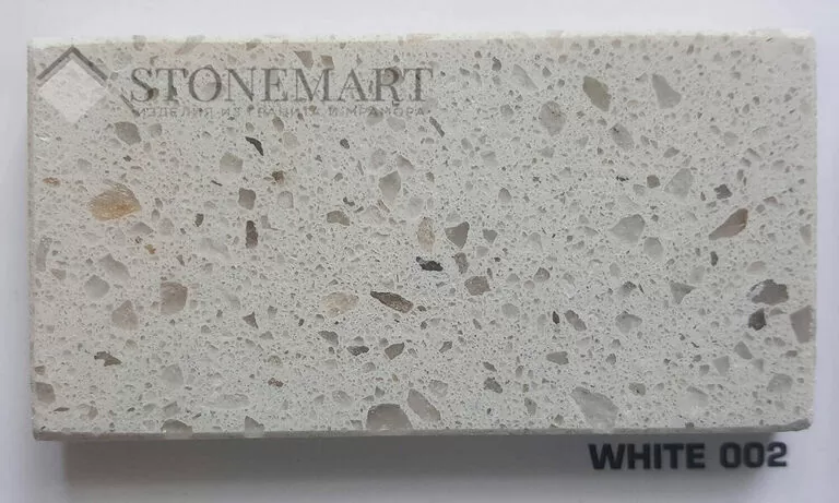 Камень: кварцит. Декор: White 002. Цвет: белый с крупными и мелкими вкраплениями